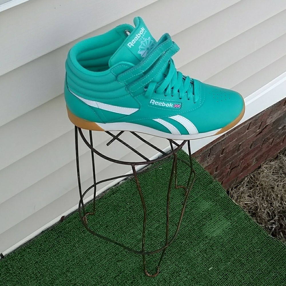Women's teal Reebok freestyle